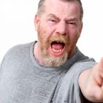angry man shouting and pointing
