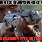Moar African Militia Advice | HOLD RIFLE SIDEWAYS WHILST FIRING; FOR MAXIMUM EYES ON TARGET | image tagged in african militia advice,gun,stupid,advice | made w/ Imgflip meme maker
