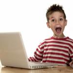 excited kid computer
