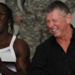 Vince McMahon and R-Truth laughing