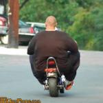 fat guy on a bike