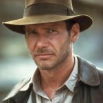 indiana jones | PG-13...YEA RIGHT MPAA! HAVE YOU SEEN THE "NEW" BRUCE JENNER SHOW !?! | image tagged in indiana jones | made w/ Imgflip meme maker