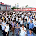 north korean enthusiastic fist wavers