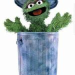 Oscar in trash can