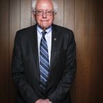 Bernie Sanders standing | REMOVE SYMBOLS OF CULTURAL HATE; THIS MAN SUPPORTED VIOLENT PROTESTERS. | image tagged in bernie sanders standing | made w/ Imgflip meme maker