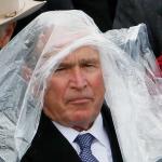 George W Bush with poncho