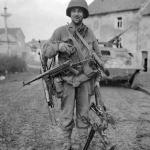 WW2 soldier with 4 guns