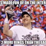 Eli Manning Superbowl | GETS MADE FUN OF ON THE INTERNET; HAS 2 MORE RINGS THAN THE EAGLES | image tagged in eli manning superbowl | made w/ Imgflip meme maker