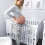 Pregnant woman in nursery