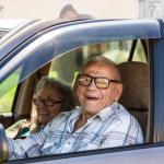 Old couple in car