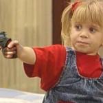 little girl with gun