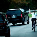 cyclist giving Trump the finger