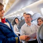 stewardess with family on plane