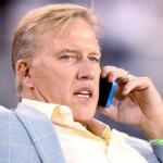 Elway on phone