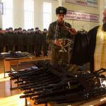 russian priest blessing guns