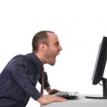 Man yelling at computer