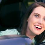 OAG smiling in car craziness meme