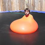 Man in water balloon  