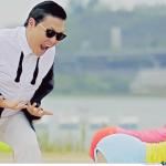 PSY angry with two women showing off their booties