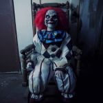 Creepy clown in chair | MERRY; CHRISTMAS | image tagged in creepy clown in chair | made w/ Imgflip meme maker