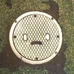 manhole cover sad