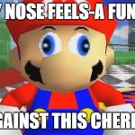 Fruit Week Dec. 10-16. A Benjamin Tanner Event. | MY NOSE FEELS-A FUNNY; AGAINST THIS CHERRY. | image tagged in smg4 retarded mario | made w/ Imgflip meme maker