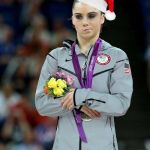 gymnast | WHEN THAT ONE COWORKER YOU LIKE... DOESN'T GO TO THE OFFICE CHRISTMAS PARTY. | image tagged in gymnast | made w/ Imgflip meme maker