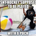Hockey goalie beachball | ISNT HOCKEY SUPPOSED TO BE PLAYED; WITH A PUCK | image tagged in hockey goalie beachball | made w/ Imgflip meme maker