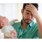 Frustrated man with baby