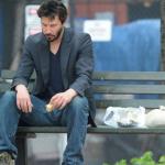 Sad Keanu Reeves on a bench