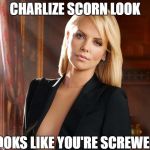 evil charlize  | CHARLIZE SCORN LOOK; LOOKS LIKE YOU'RE SCREWED | image tagged in evil charlize | made w/ Imgflip meme maker