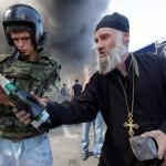 Orthodox Priest lighting Molotov meme
