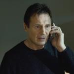 Liam Neeson on phone