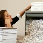 bored shredder paper woman