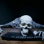 skeleton waiting computer