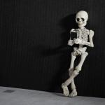 skeleton waiting for text message
