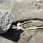 Skeleton crushed by volcanic rock from pompeii