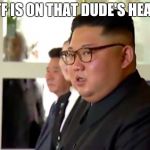 Kim Jong Un WTF | WTF IS ON THAT DUDE'S HEAD? | image tagged in kim jong un wtf | made w/ Imgflip meme maker