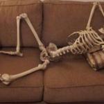 Skeleton waiting on couch