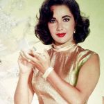 Elizabeth Taylor getting | I'M JUST GETTING READY FOR MY CLOSE-UP; I'M WAY BETTER THAN THAT JOAN COLLINS | image tagged in elizabeth taylor getting | made w/ Imgflip meme maker