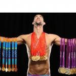 michael phelps posing with medals