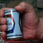 Andre the giant holding beer can