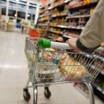 Shopping Cart Pushing Down Isle