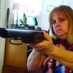 Woman with shot gun