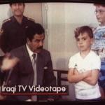 Saddam and boy on TV