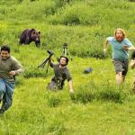 4 guys run away from bear