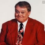 louie anderson in red jacket