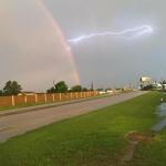 Lightning strikes rainbow