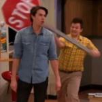 Gibby hitting Spencer with a STOP sign