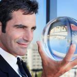 man holding crystal ball